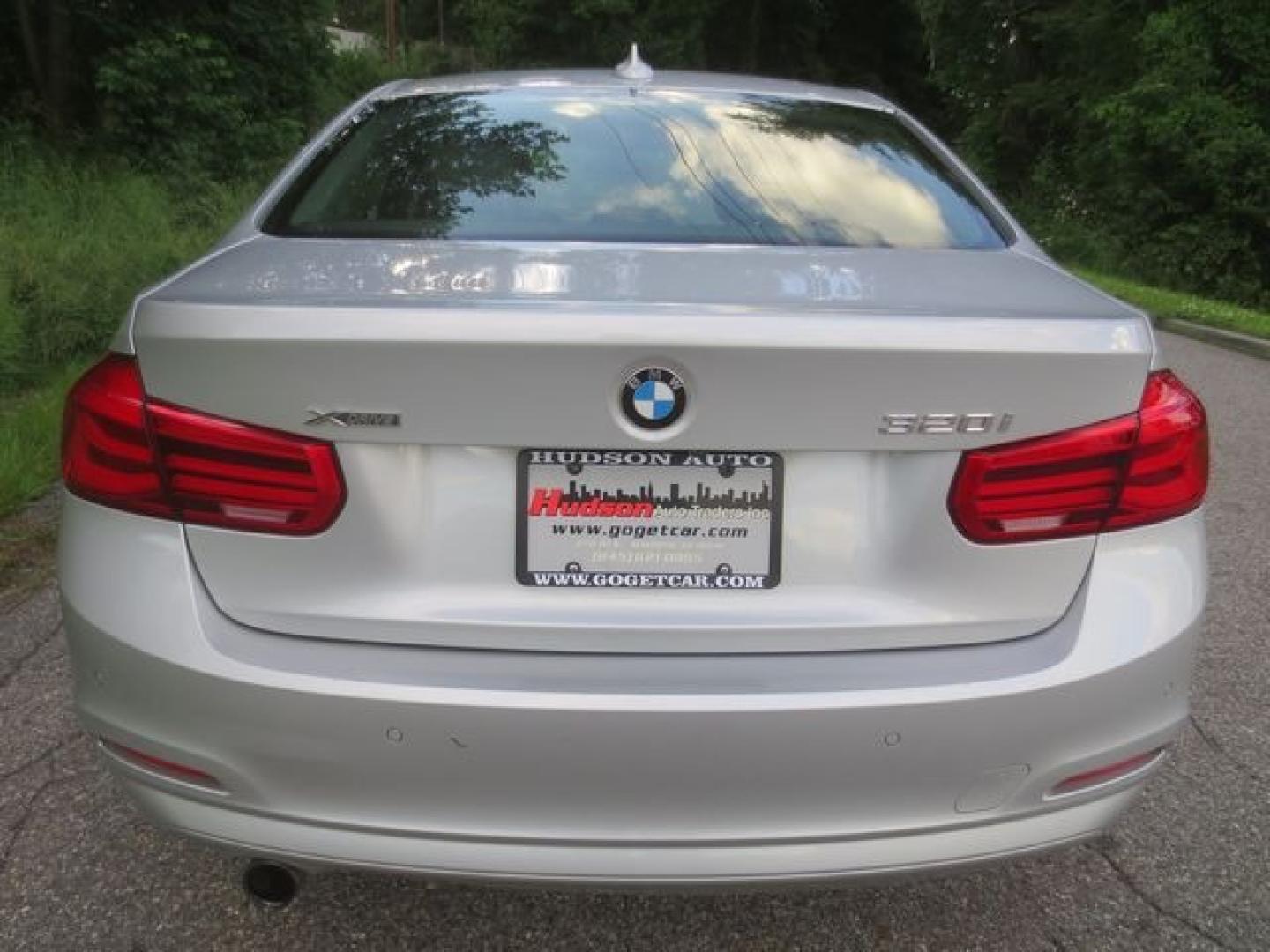 2016 Blue /Black BMW 3-Series (WBA8E5G59GN) with an 2.0l 4cyl Turbo engine, Automatic transmission, located at 270 US Route 6, Mahopac, NY, 10541, (845) 621-0895, 41.349022, -73.755280 - Photo#5